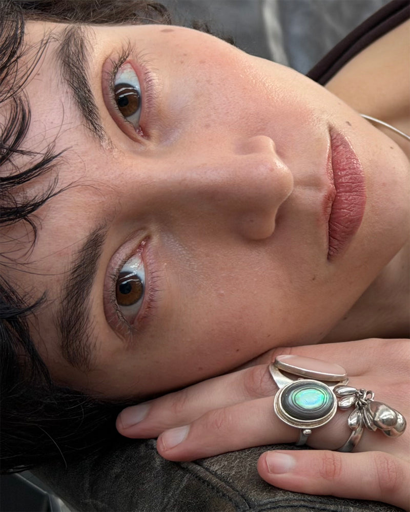 silver vintage ring with a opalescent gemstone