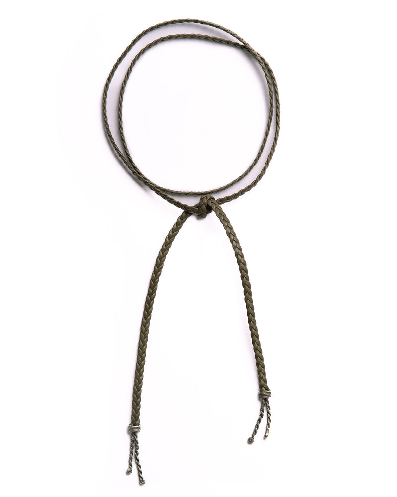 Braided leather choker with chain ends, layered on a neutral background, showcasing its versatile styling options