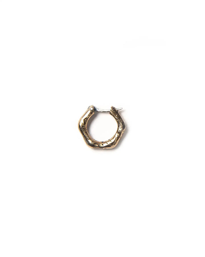 A timeless single bronze hoop earring with a textured finish.