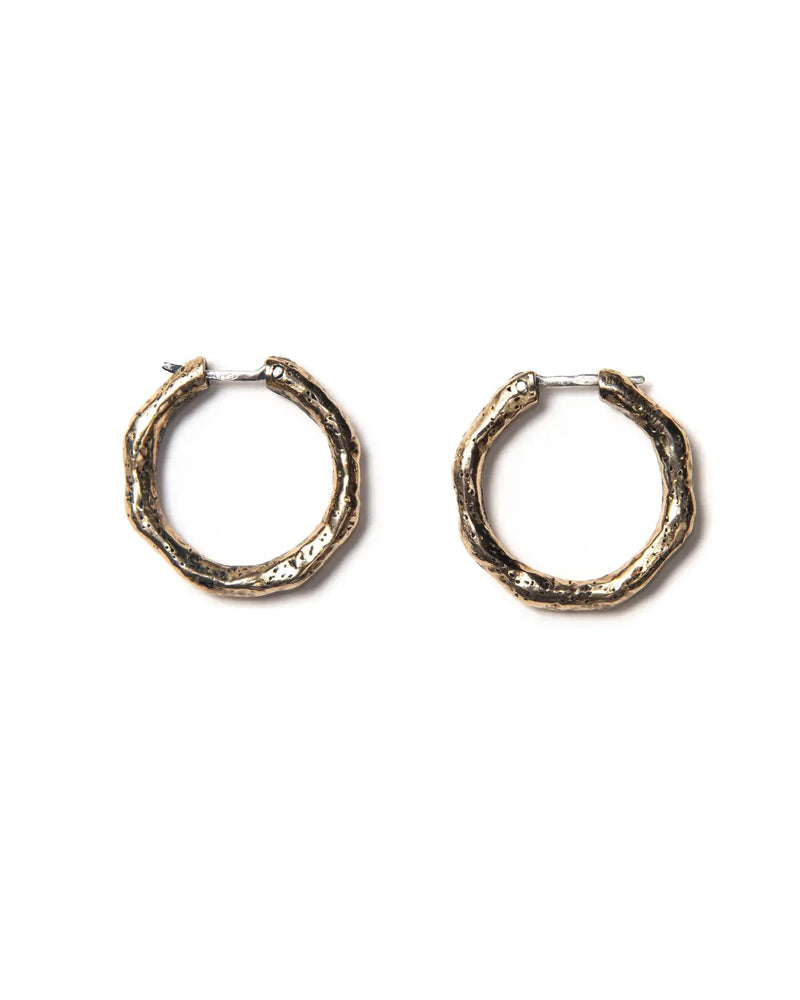 A pair of bronze hoop earrings with a textured finish.