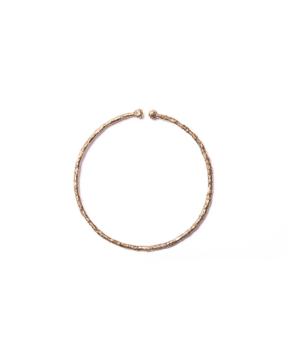 Front view of the organic textured bronze ear cuff highlighting its design and craftsmanship