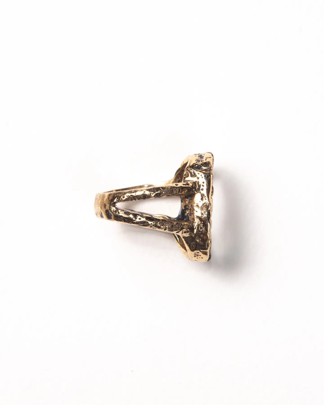 side view of a gold ring showing a double band and raw finish