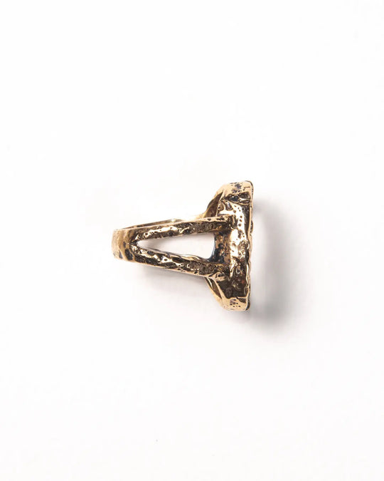 side view of a gold ring showing a double band and raw finish