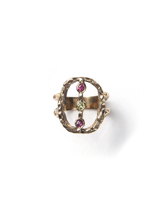 A bronze ring with a textured finish and adorned with natural stones