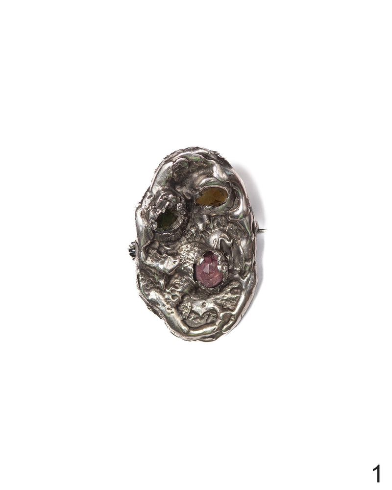 Silver pendant with textured finish and natural colorful stones