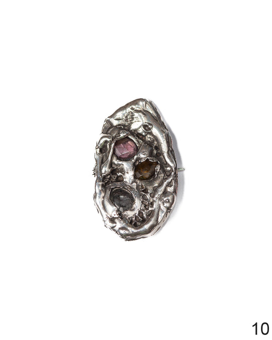 Custom-designed silver charm with textured details and natural watermelon tourmalines, one of a kind