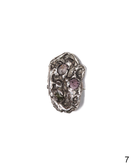 Limited edition silver brooch with textured craftsmanship and stunning watermelon tourmaline gemstones