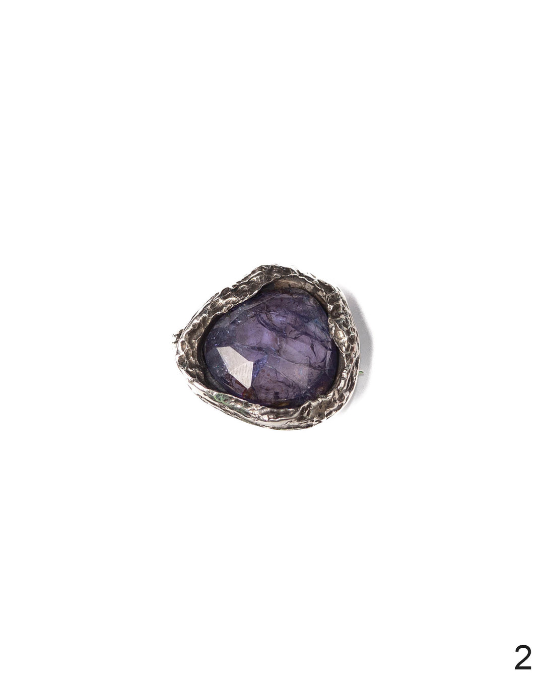 One-of-a-kind Kunzite brooch with a textured silver setting, blending natural beauty with intricate craftsmanship