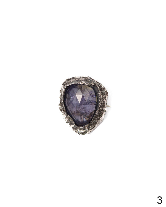 Artistic Kunzite charm with a detailed textured silver setting, ideal as a distinctive jewelry piece