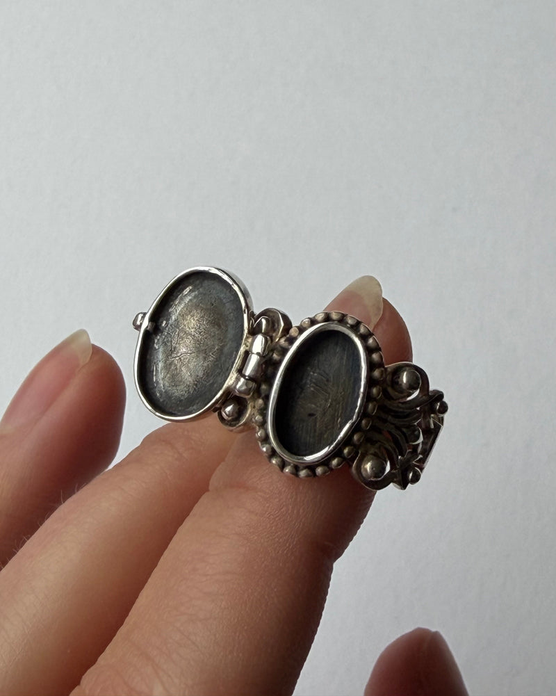 Silver ring with intricate design