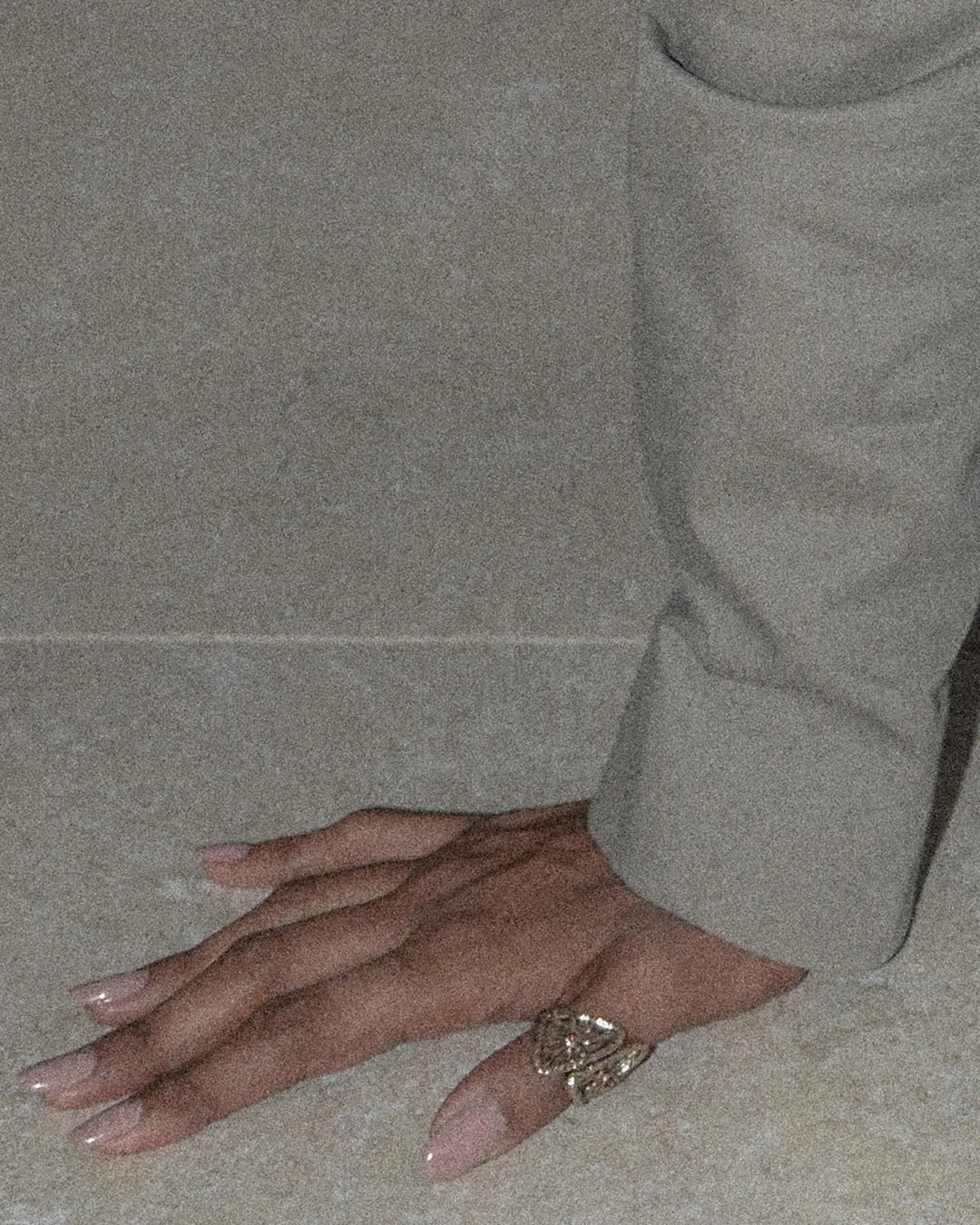 Gold ring worn on thumb finger