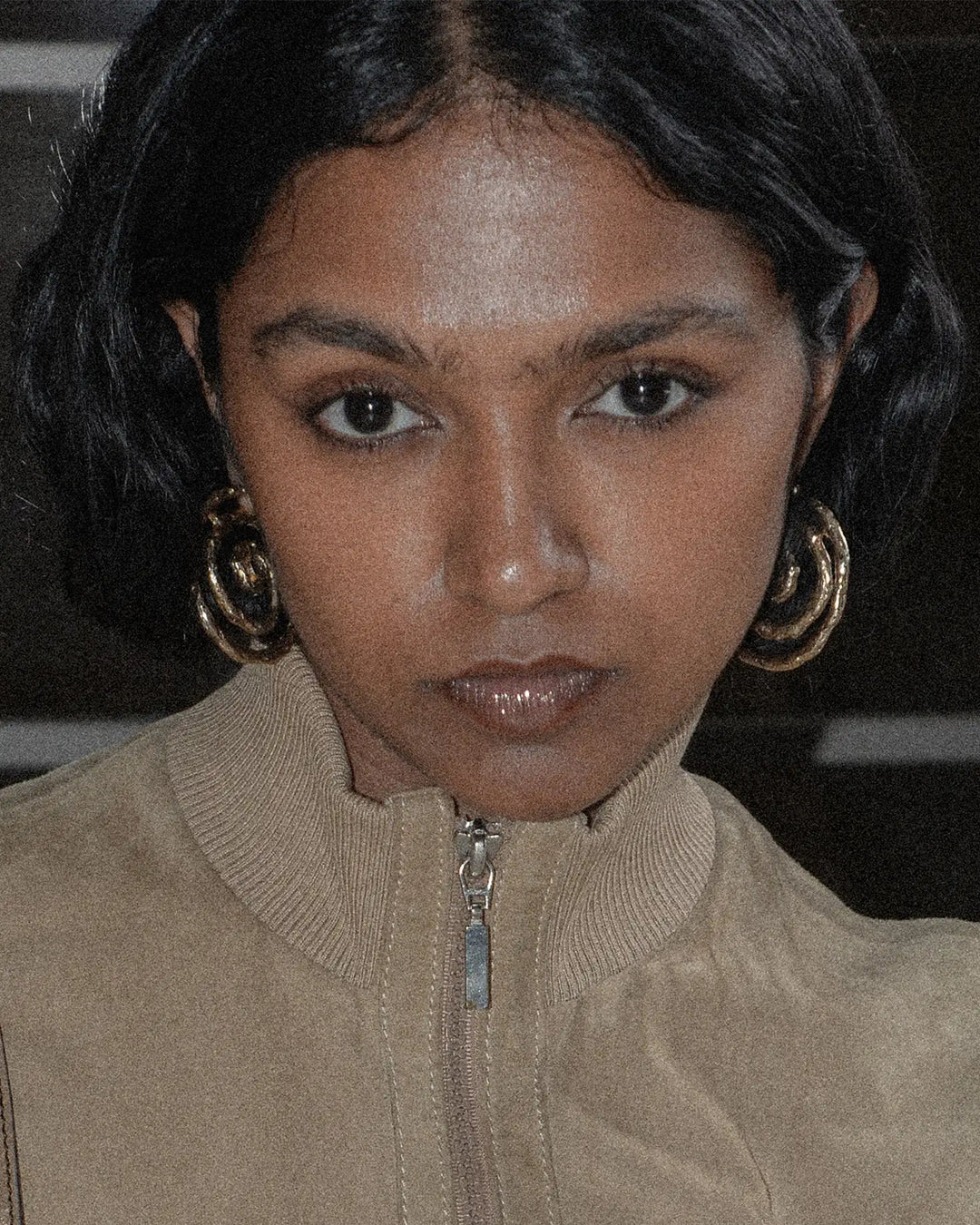 pair of bronze large earrings with vintage yet edgy look
