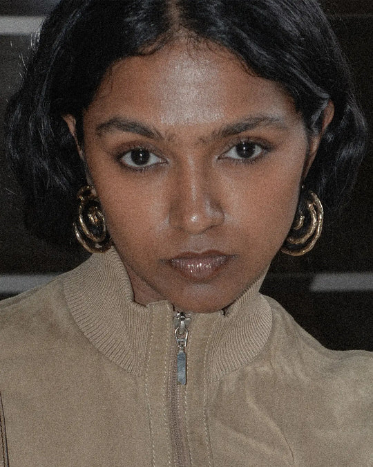 pair of bronze large earrings with vintage yet edgy look