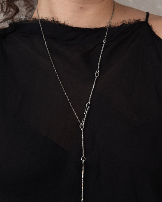 SILVER NECKLACE details on model