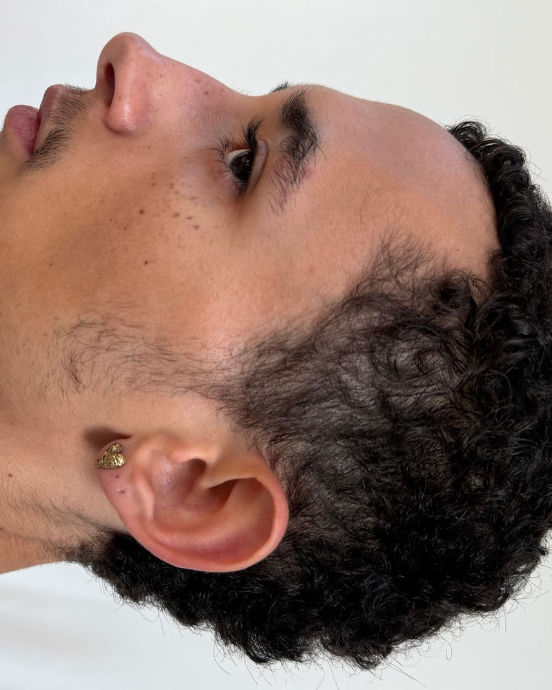 Refined textured heart stud earring, a chic and adaptable accessory ideal for any event